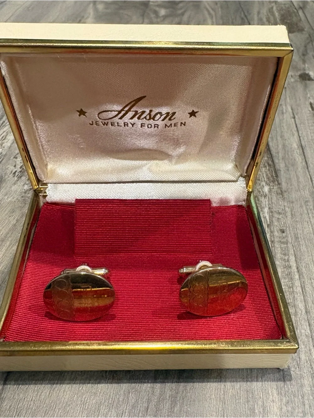 Anson vintage gold-tone oval cufflinks ft. textured wave and pillar R Engraving